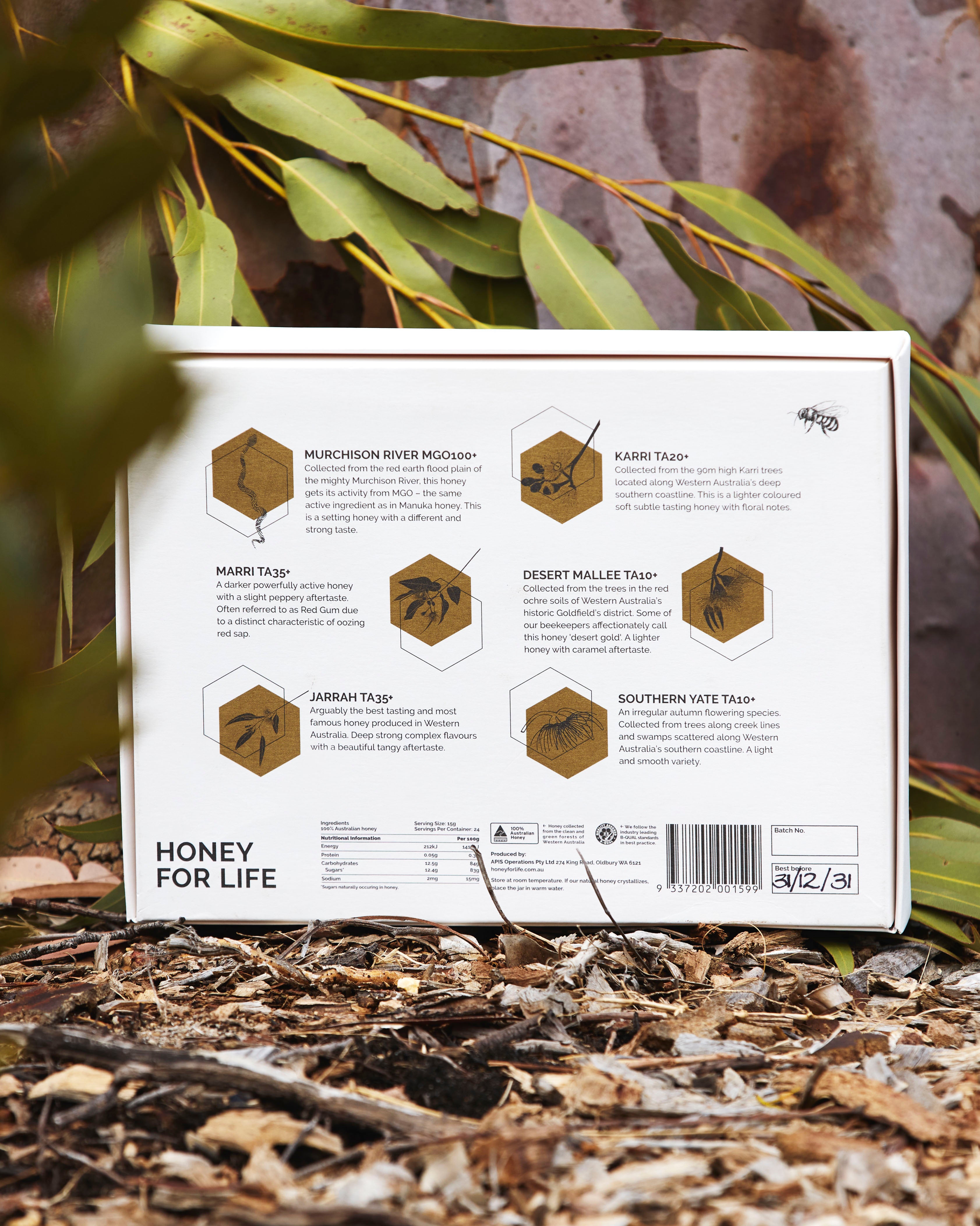 Honey for Life product packaging with honeycomb illustrations and text on a natural background