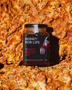 Jar of Honey for Life Desert Mallee honey on a rocky background